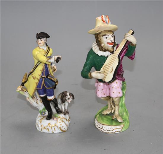 A 19th century Meissen figure of a huntsman and a 19th century English porcelain monkey band figure, 13.5cm and 16cm